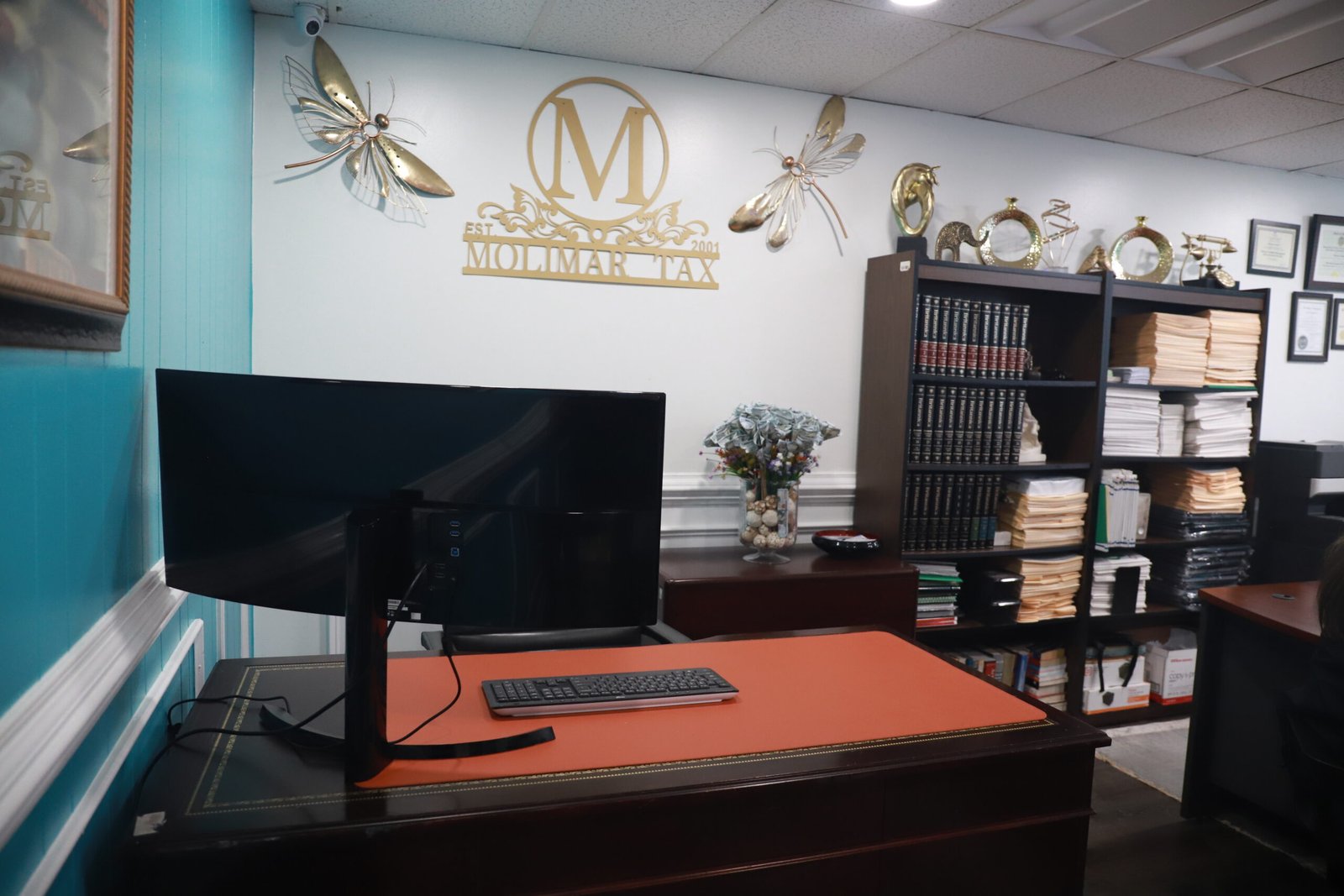 Molimar Tax Consulting — oficina y equipo